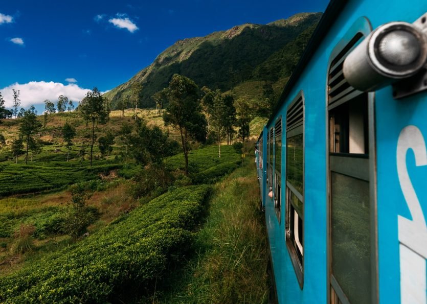 Blue train in Sri Lanka. Blue Sri Lankan Train goes through jungles, trees, wood, mountains